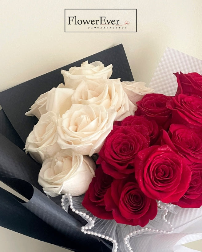 24 Stem Red and White Rose Arrangement Wrapped in Black & White Paper