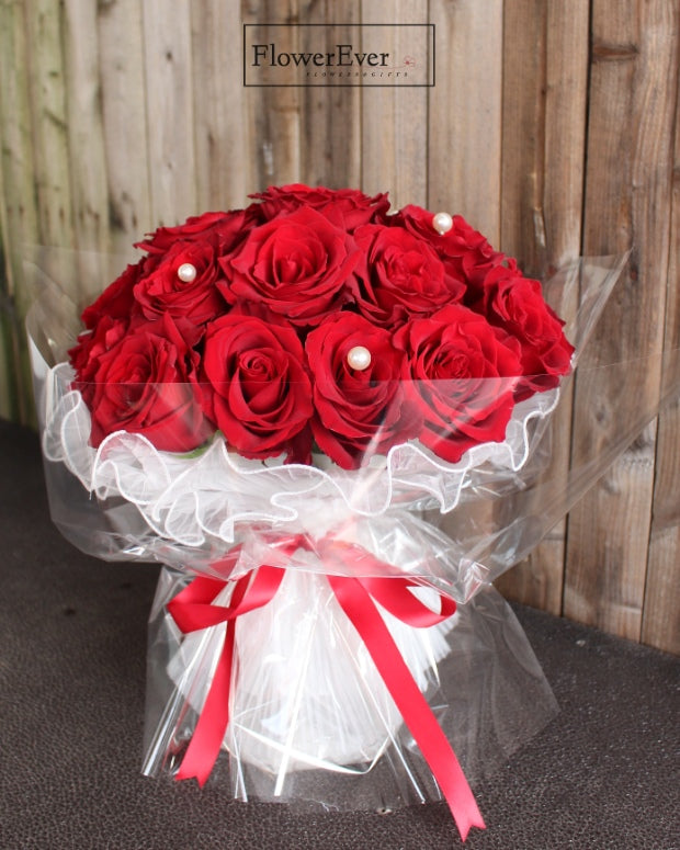An Enchanted Collection: 24 Red Roses in White Lace & Pearl Accents