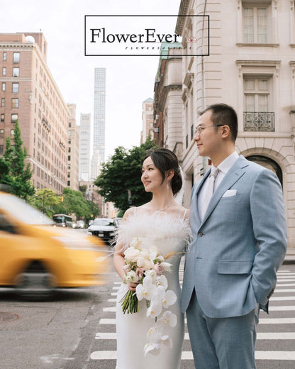 A cascading beauty: White &amp; Pink Orchids Bridal Bouquet