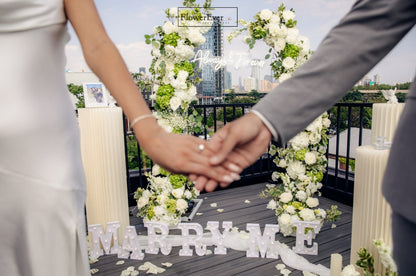 Unforgettable NYC proposal: Floral Arch and Aisle Flowers Package