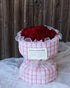 A Touch of Elegance: 12 White and Red Roses in Pink Chanel Russian Bouquet