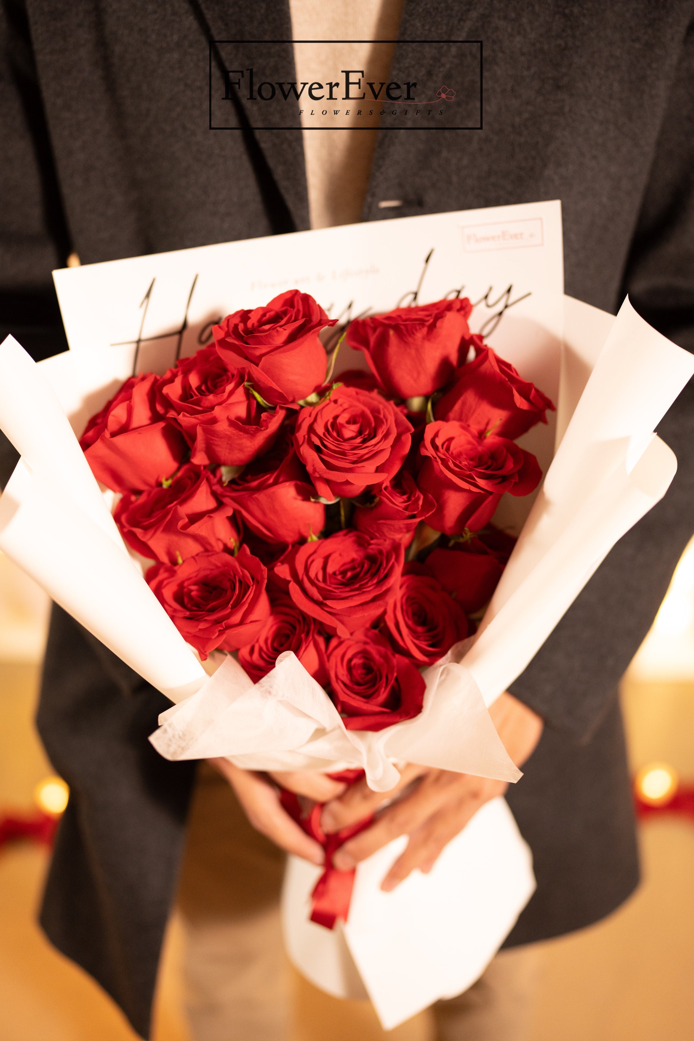 Enchanting NYC proposal package featuring 3 ft. letters, candles, and rose petals