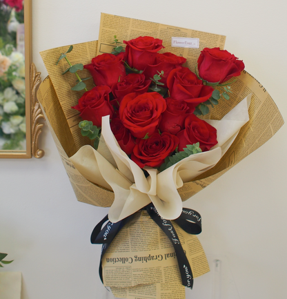 Classic Red Rose Bouquet in Vintage Brown Newspaper