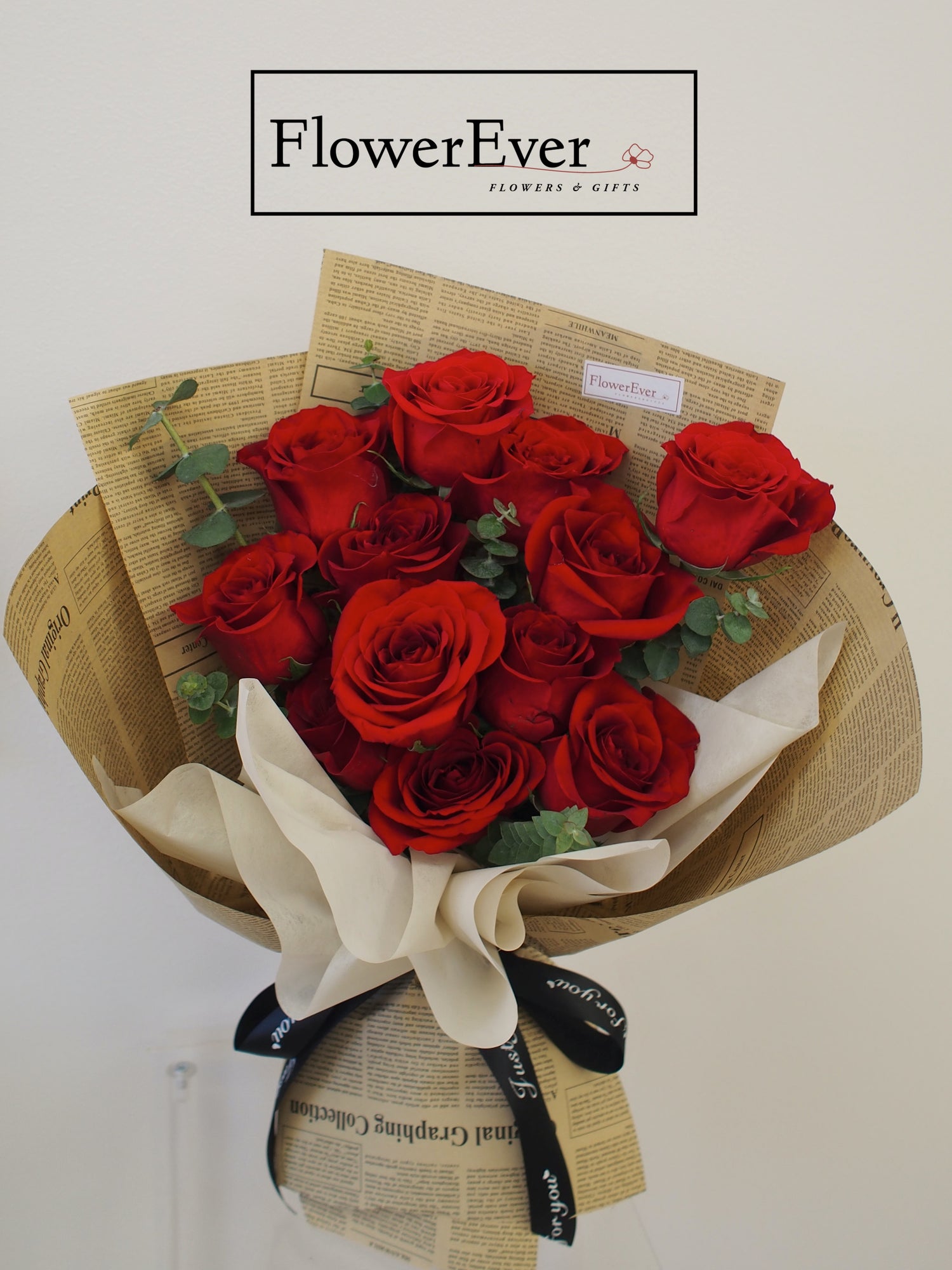 Classic Red Rose Bouquet in Vintage Brown Newspaper