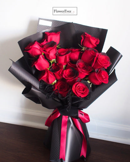 A Bundle of Beauty: Midnight Red Rose Bouquet (16 Stems) in Black Paper