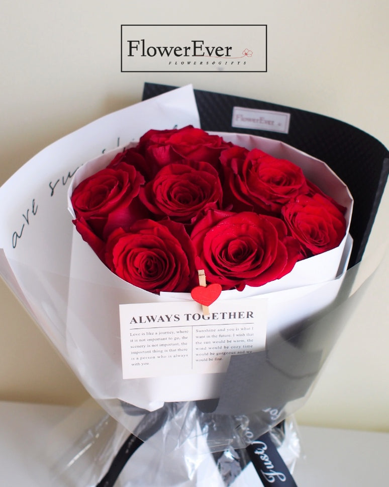 A Dozen Red Roses in a Stunning Black & White Russian Bouquet