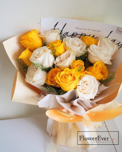 Charming Yellow and White Roses in Delicate Pastel Yellow Wrapping | 16 Stems