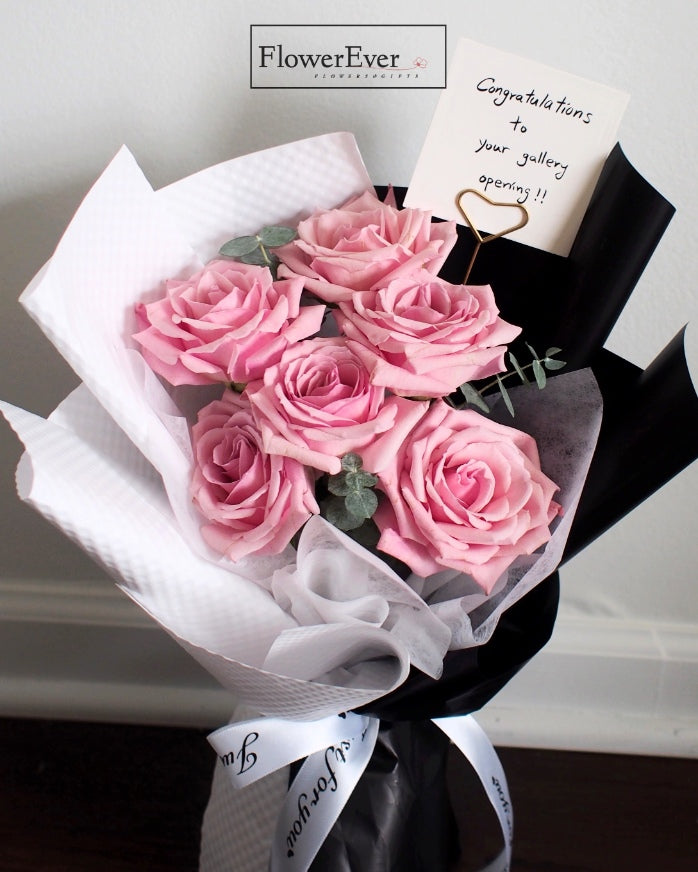 A Lovely Bouquet Featuring Pink Roses in a Black &amp; White Floral Paper