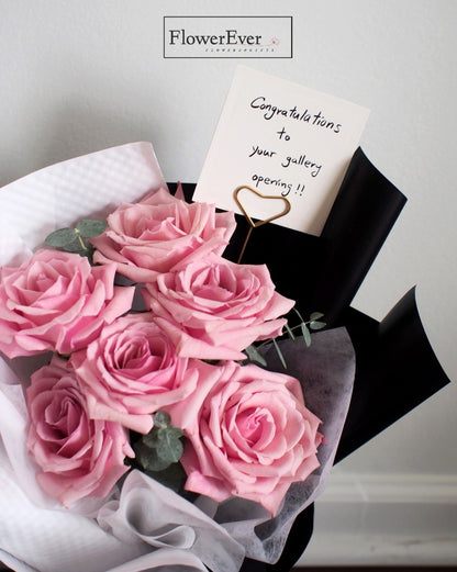 Breathtaking Pink Rose Arrangement | 12 Stems in Black &amp; White Floral Wrap