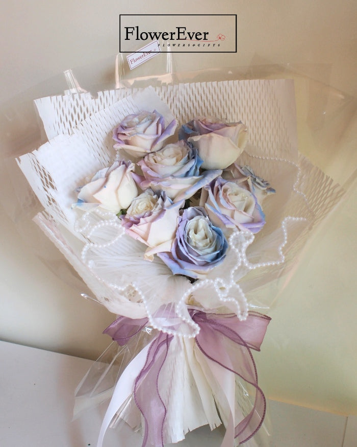 A Dozen Enchanting Twilight Roses in a White Floral Bundle