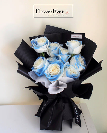 An Ice Blue Beauty: 12-Stem Rose Bouquet in Black Paper