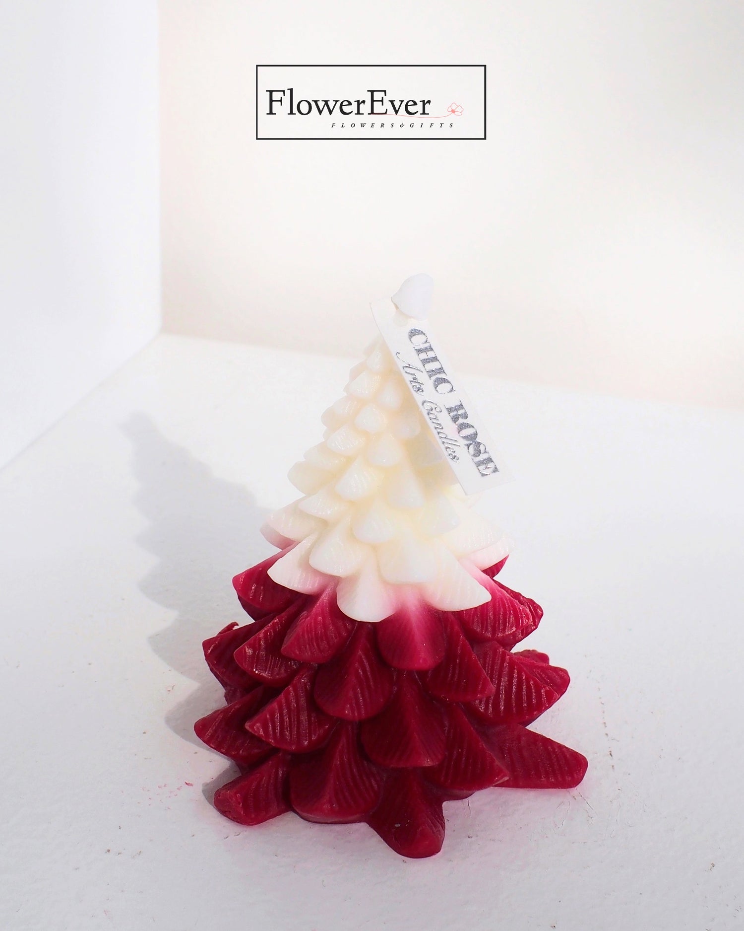 Add Sparkle to Your Holidays with the Snowy Christmas Tree Candle