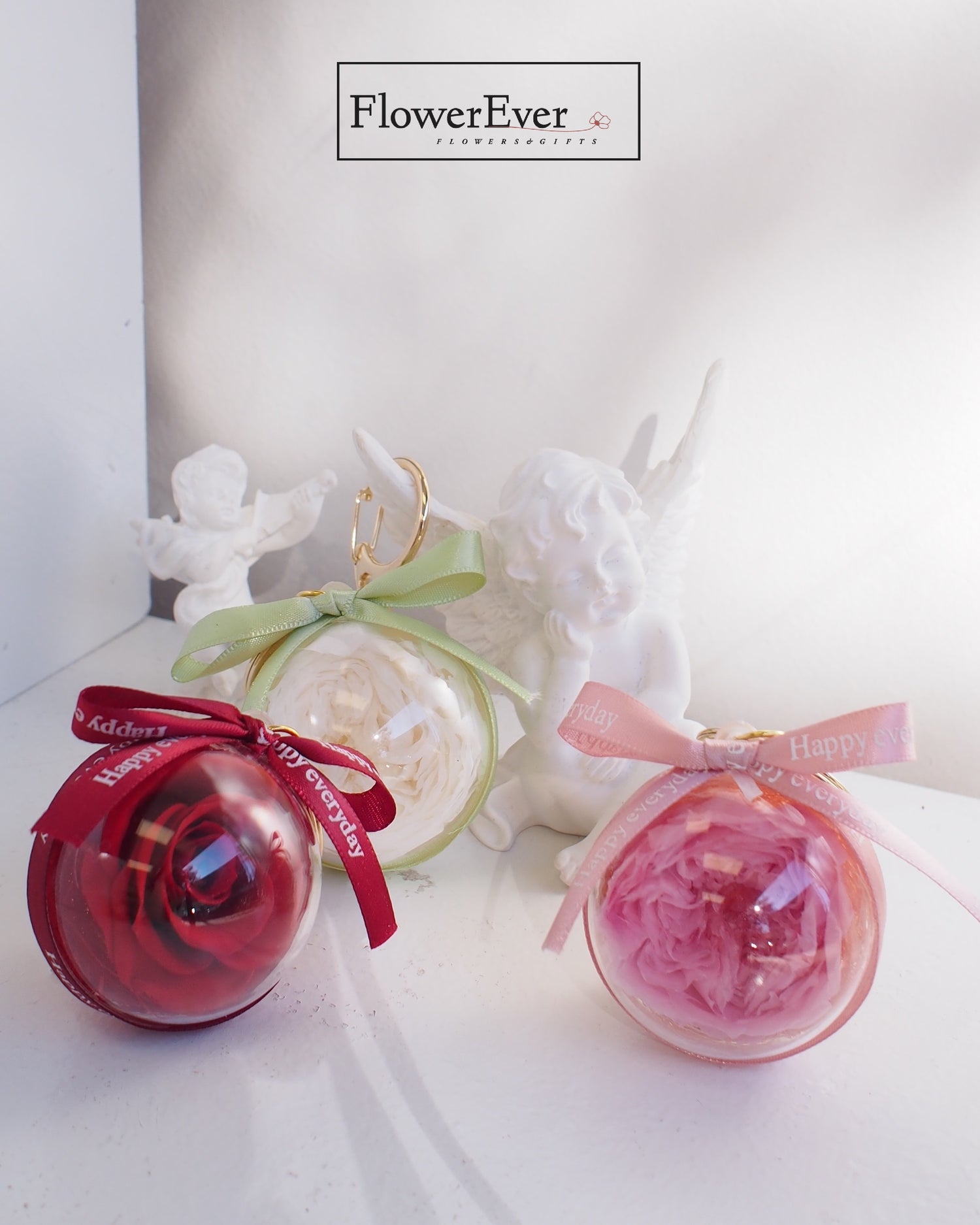 charming keychains with preserved roses inside acrylic ball