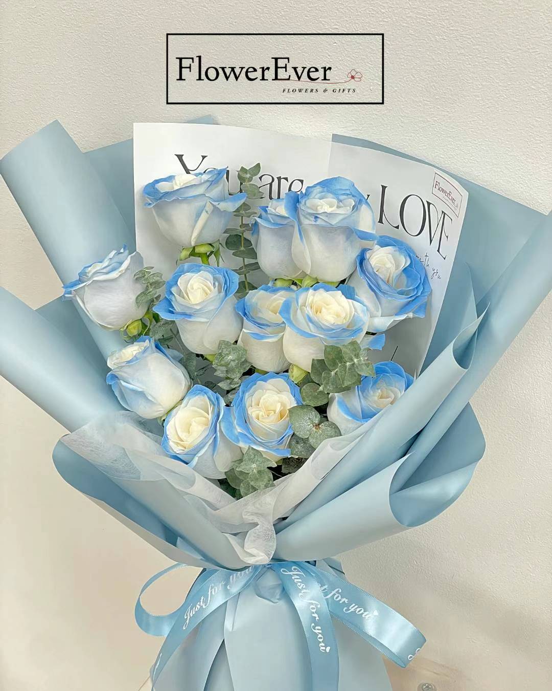 Ice Blue Rose Bouquet in Blue Paper