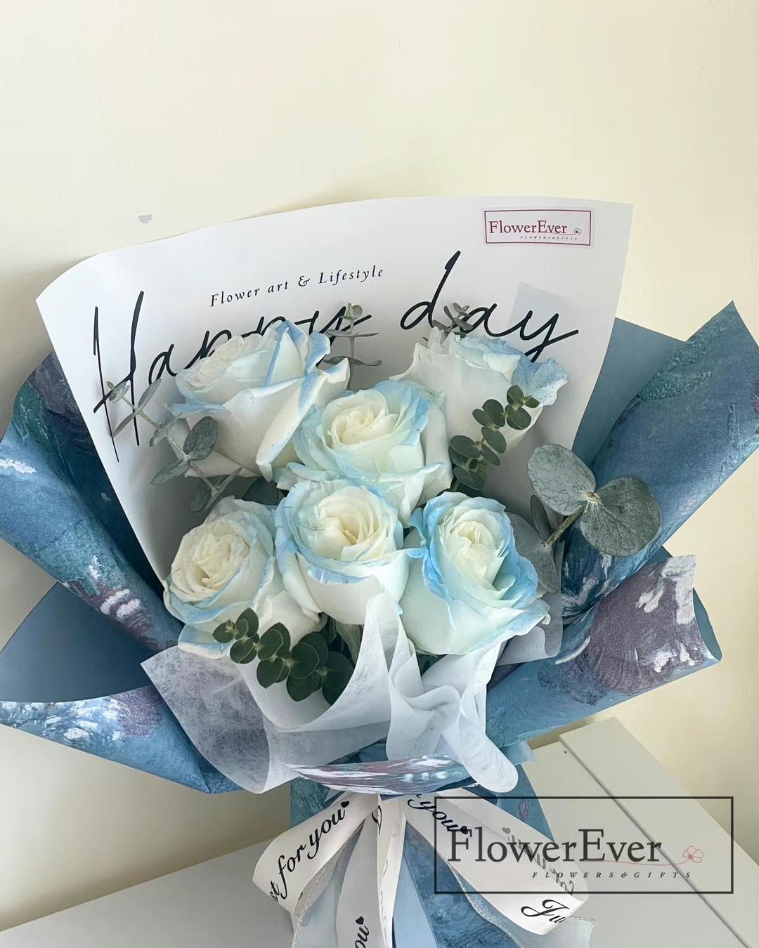 Ice Blue Rose Bouquet in Modern Blue Paper