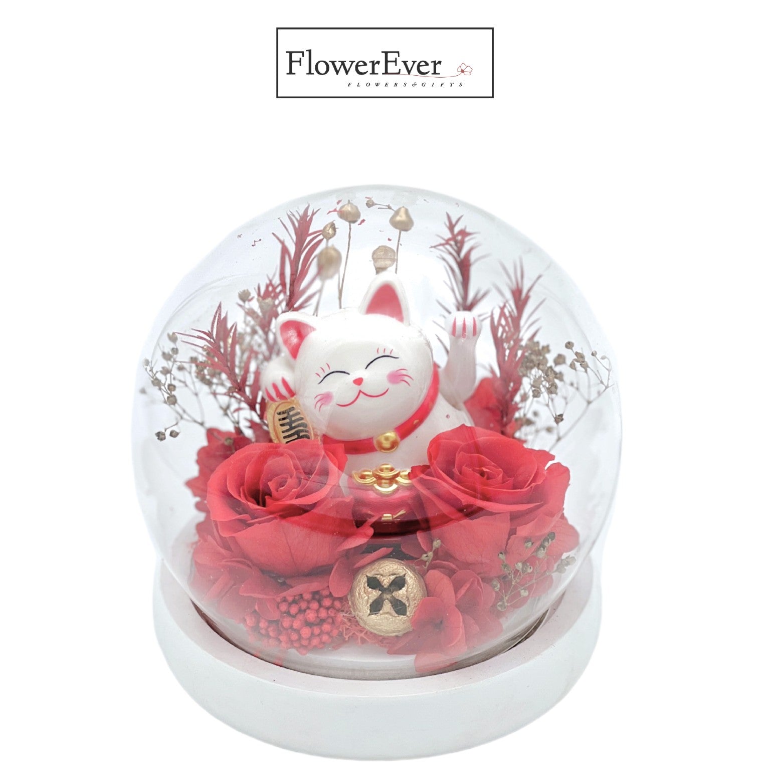 A glass dome containing a lucky cat figurine surrounded by preserved red flowers given as a grand opening gift