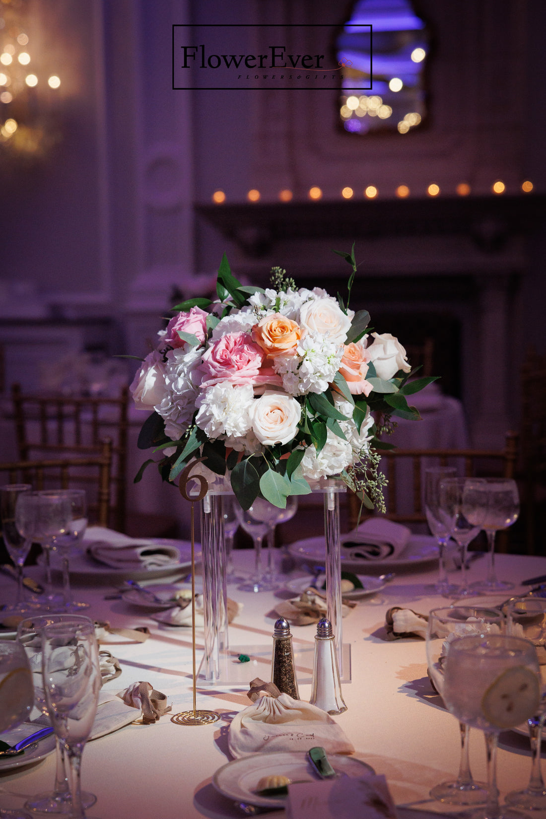 Wedding floral detail – Wedding Reception Centerpieces on Clear Acrylic Stands – NYC wedding florist