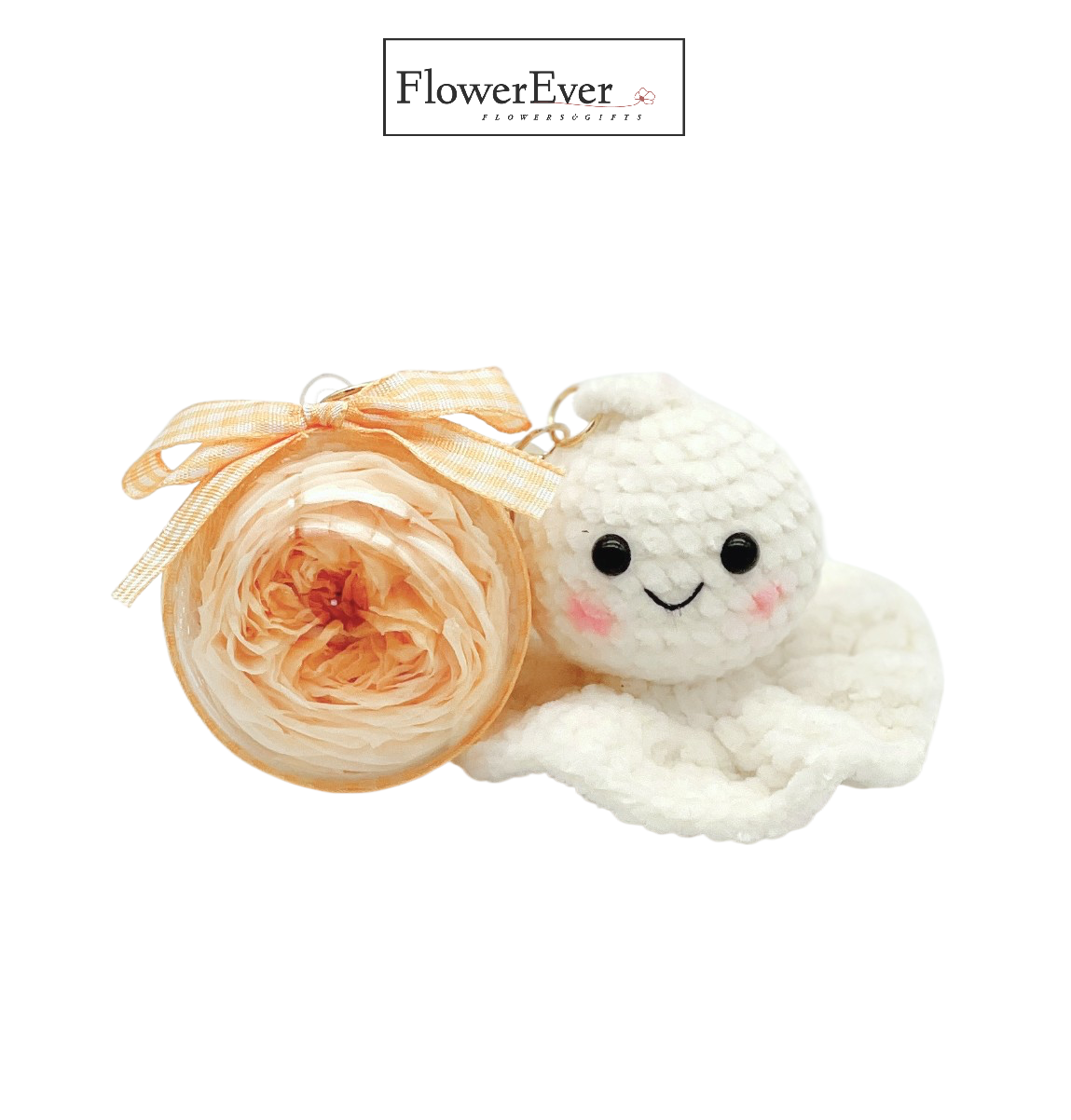 A white crocheted teru teru bozu &quot;sunny day&quot; doll keychain with a tiny preserved yellow flower accent